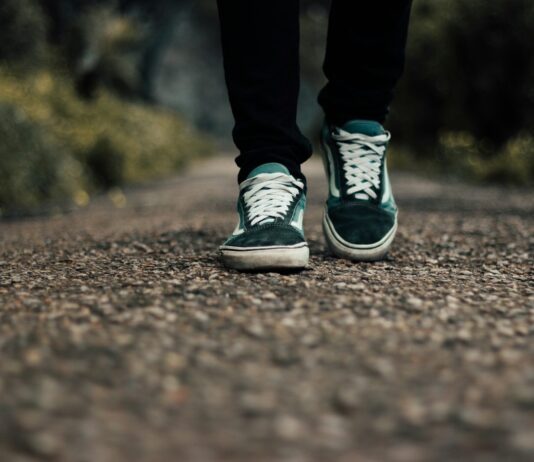 일상 속 만성피로, 작지만 꾸준한 변화가 해답 a person standing on a gravel road with their shoes on