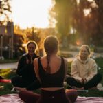 여성 건강, 일상 속 작은 변화로 지키는 지혜 a group of people sitting on top of a lush green field